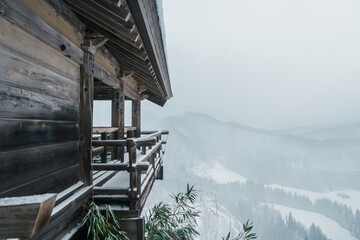 view of village with snow in winter from mountain viewpoint of Yamadera temple, the popular name...