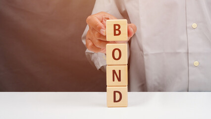 Bond financial concept on wooden blocks isolated transparent