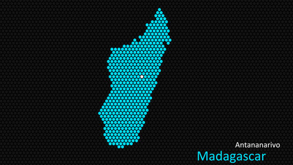 A map of Madagascar, with a dark background and the country's outline in the shape of a colored hexagon, centered around the capital. A simple sketch of the country