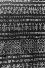 A black and white photo of a striped fabric