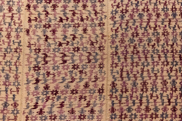 Fototapeta premium A patterned rug with a mix of colors and shapes