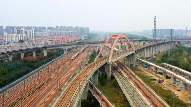 Footage Of Modern High Speed Express Train Pulling Into A Mainline Railway Station At Rail Line Station