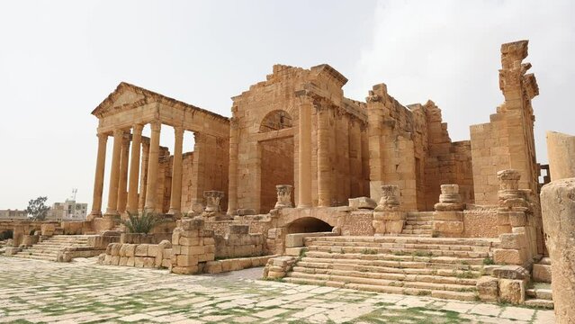 Ruins of ancient Roman capitol forum on territory of antic city of Sufetula in area of modern Tunisia. Half-destroyed buildings from time of Roman Empire. Roman Forum of Sufetula 