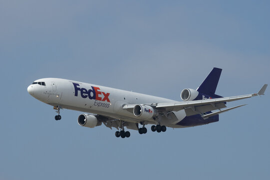 FedEx McDonnell Douglas MD-11 aircraft, registration N620FE, shown on final approach to Los Angeles International Airport (LAX), California, USA, on May 12, 2024.