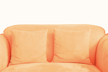 Sofa with pillow against white wall trending color of the year 2024.