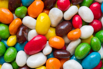 Round multi-colored candies close-up. Sea pebble candies.