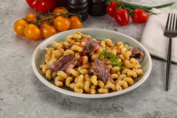 Italian pasta cellentani with anchovy