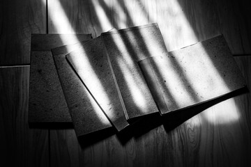 a book exposed to light in a dark room