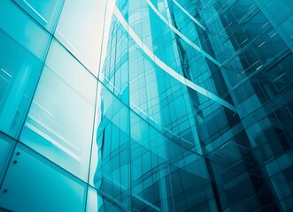 Fototapeta premium Blue glass building with reflection, closeup, modern architecture background 