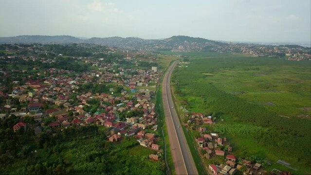 Residential Area Close to the Kampala-Entebbe Expressway in Uganda, East Africa - Drone Flying Forward