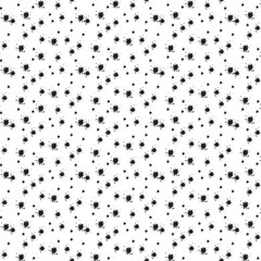 Black blots of different sizes. Seamless pattern on a transparent background. Design for fabric, print on cups, bags, T-shirts.