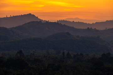 Blurred nature background of sky lights Evening with colorful lights A bright twilight of pinks and oranges, with a cool breeze blowing through.