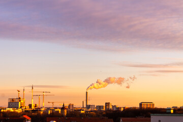 Urban Sunset and Industrial Silhouette in Malmo
