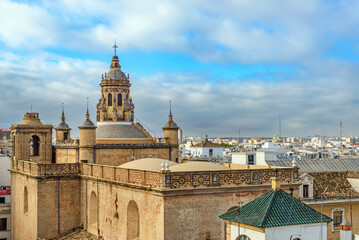 Fototapeta na wymiar view of the dome and bell tower of the Annunciation Church in Seville, Spain