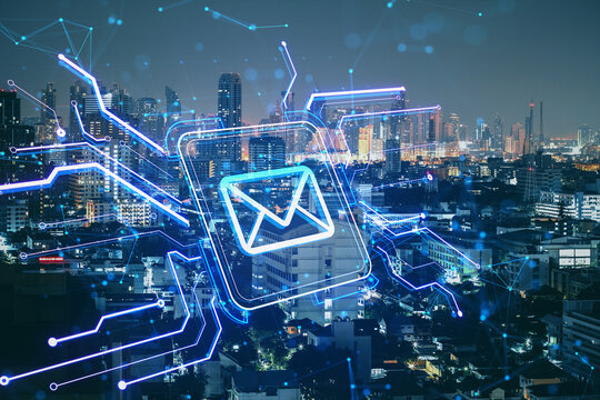 Creative square circuit button hologram with email icon on blurry night city backdrop. Technology and e-mail newsletter concept. Double exposure. - Powered by Adobe