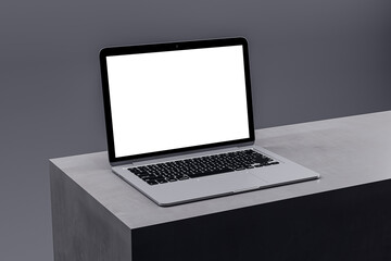 Sleek laptop on minimalist podium with a white screen ready for branding, ideal for tech showcases....