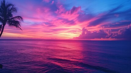 A tropical sunset, where the sky transitions from warm oranges and pinks near the horizon to deep...