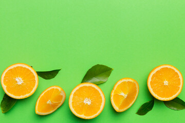 fresh Fruit orange slices on colored background. Top view. Copy Space. creative summer concept. Half of citrus in minimal flat lay with copy space