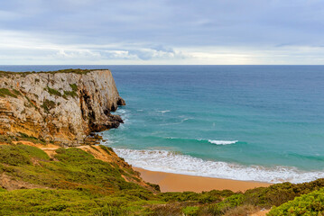 view of the natural landscape of the Atlantic Ocean, rocky coast and sandy bay, Vila do Bispo, Sagres, Algarve, Portugal