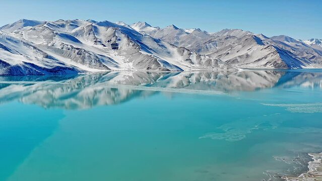 Aerial photo of Baisha Lake in Pamir Plateau, Xinjiang, China after snow in winter