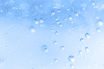 The surface of the cosmetic product has bubbles. blurred background. soft focus