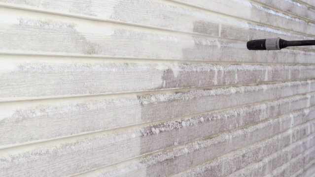 Satisfying pressure washing session. Close-up