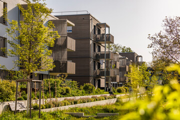 Germany, Baden-Wurttemberg, Ludwigsburg, Plants growing in front of modern apartment buildings