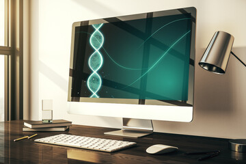 Creative light DNA illustration on modern computer monitor, science and biology concept. 3D...