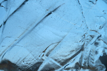 The surface of the cosmetic product has bubbles. blurred background. soft focus