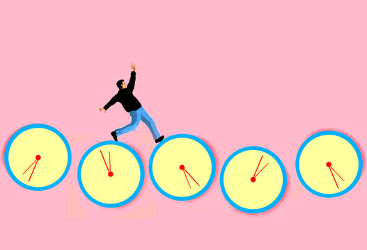 Man stumbling on clocks against pink background