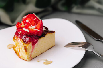 Gourmet strawberry cheesecake slice on elegant plate