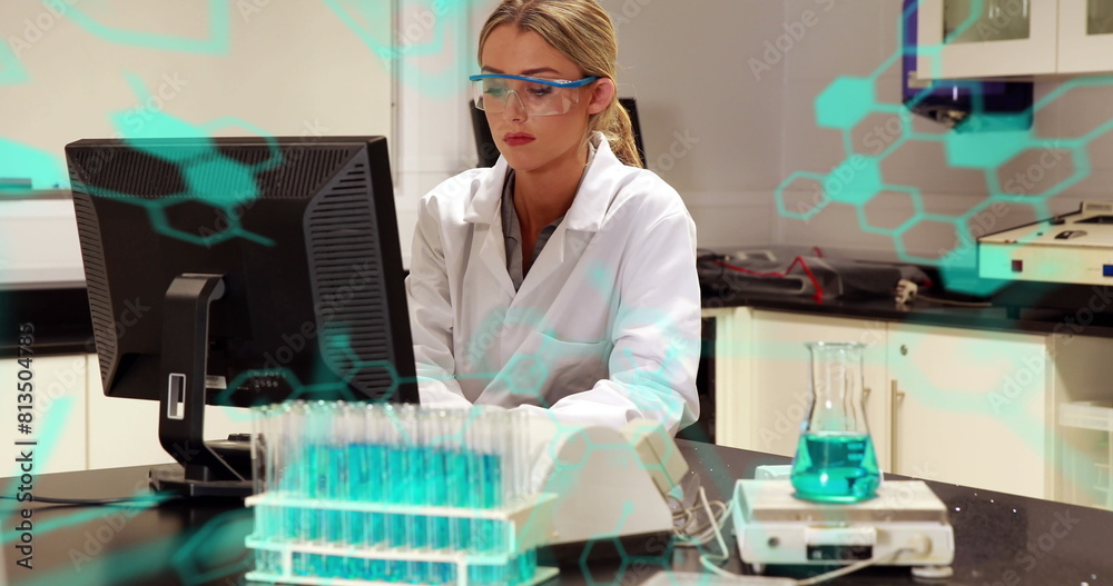 Poster image of chemical formulas and data processing over caucasian female lab worker using computer
