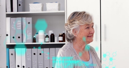 Image of chemical formulas and data processing over caucasian senior woman and male doctor