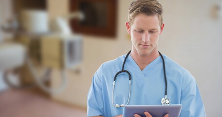 Image of caucasian male doctor over hospital