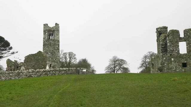 Medieval Church, St Erc's Tomb, The College, Holy Well, Motte In The Hill of Slane In County Louth, Ireland. Panning Shot

