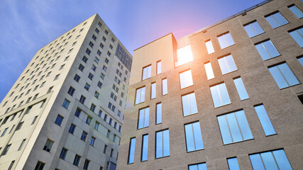 Modern office building detail. Perspective view of geometric angular concrete windows on the facade...