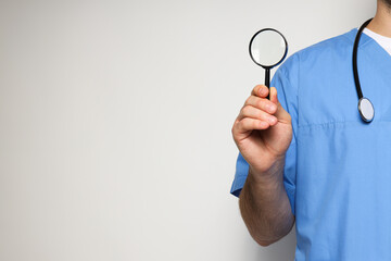 A man in a doctor's coat with a stethoscope