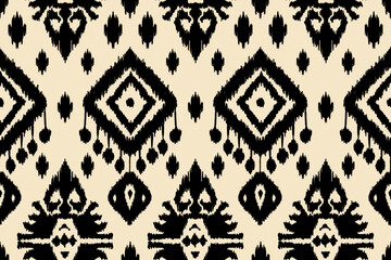 Ikat paisley embroidery on the fabric in Indonesia,India and asian countries.geometric ethnic oriental seamless pattern.Aztec style. illustration.design for texture,fabric,clothing,wrapping,carpet