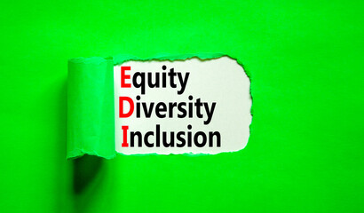 EDI equity diversity inclusion symbol. Concept words EDI equity diversity inclusion on white paper on beautiful green background. Business EDI equity diversity inclusion concept. Copy space.