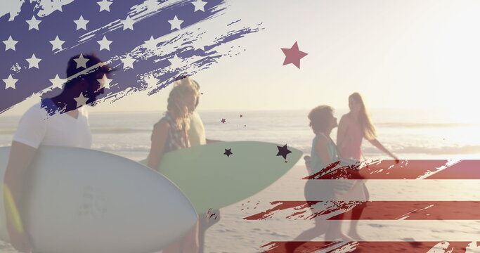 Image of flag of america over diverse friends walking with surfing walking towards ocean