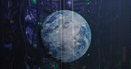 Image of rotating globe over illuminated back panel of server rack in server room