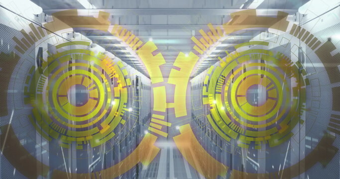 Image of loading circles over bars on data server racks in server room