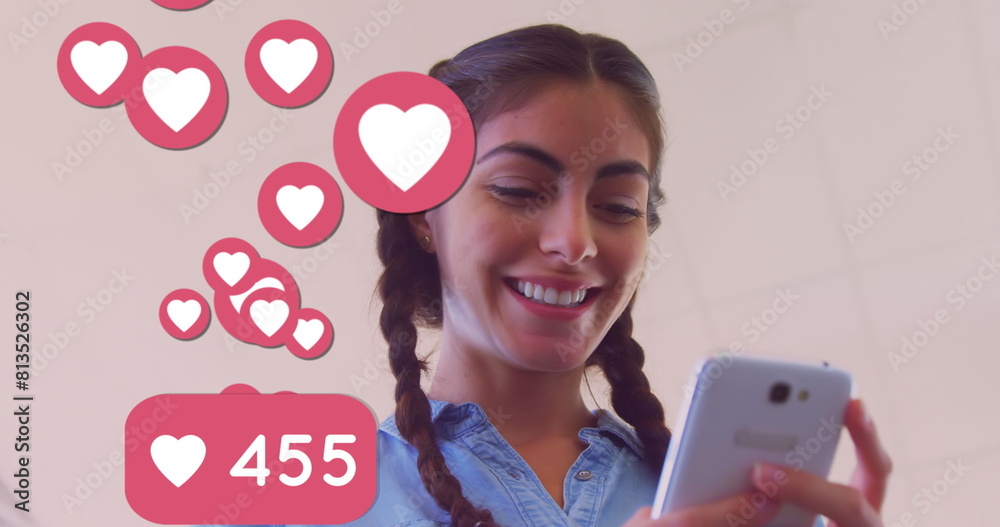 Poster multiple heart icons with increasing numbers floating against caucasian using smartphone