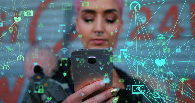 Image of neworks of connections with icons over caucasian woman using smartphone