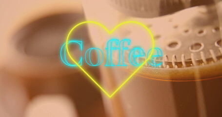 Image of heart and coffee text over cup of coffee