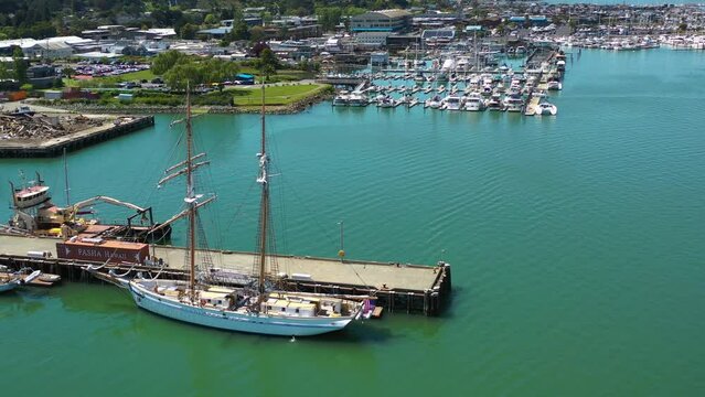 Aerial view around a tallship, docked at the Sausalito marina, in California, USA