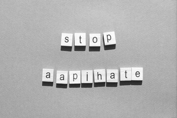 stopAapi hate concept. Flatly. Words made up of letters. Black and white color.