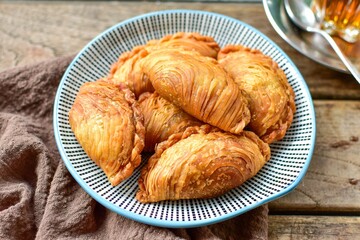 curry puff , karipap   wooden blackground retro style