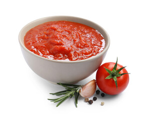 Homemade tomato sauce in bowl and fresh ingredients isolated on white