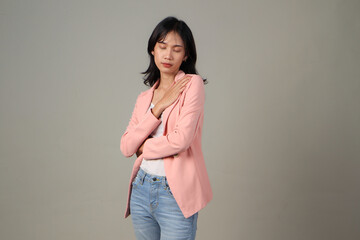 pensive asian woman wearing formal casual outfit on isolated background